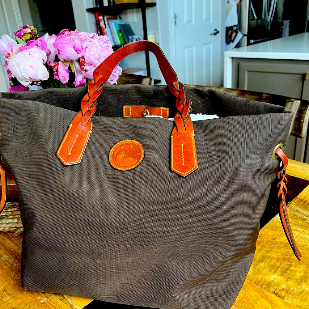 Authentic Dooney and Bourke brown tote in great condition!